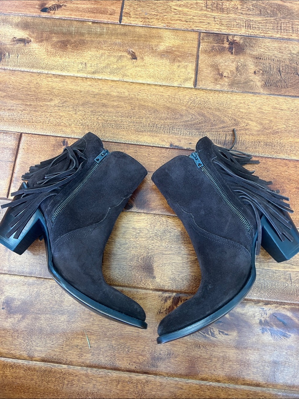 Fringe Suede Lucchese boots.